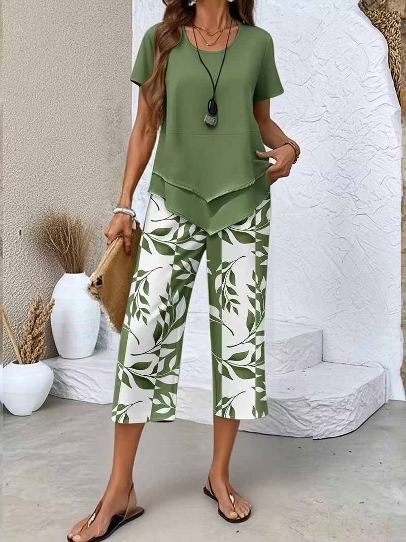 Women's leaf print two-piece outfit. Botanical summer fashion, elegant & relaxed fit short sleeve top & pants set.