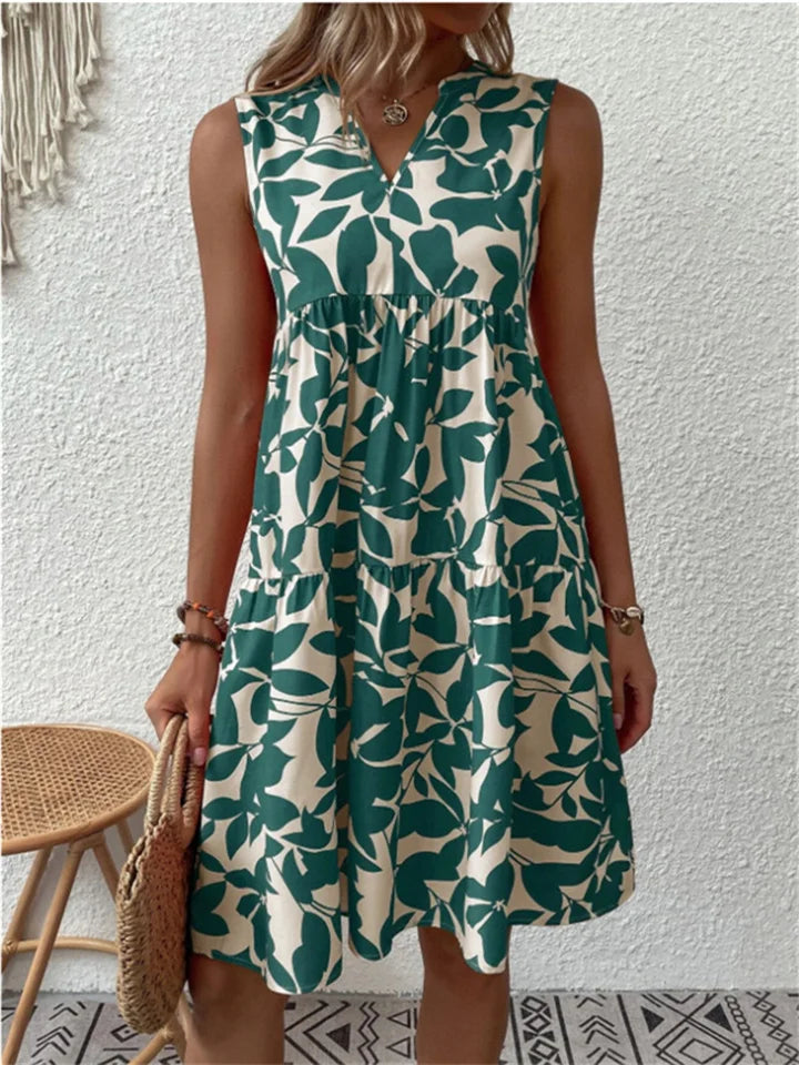 Women's leaf print V-neck mini dress, perfect for summer casual wear or vacation.