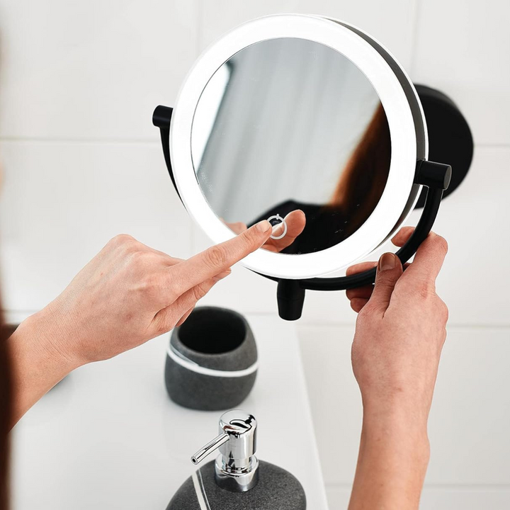 Wireless illuminated cosmetic mirror with bright LED lights for flawless beauty.
