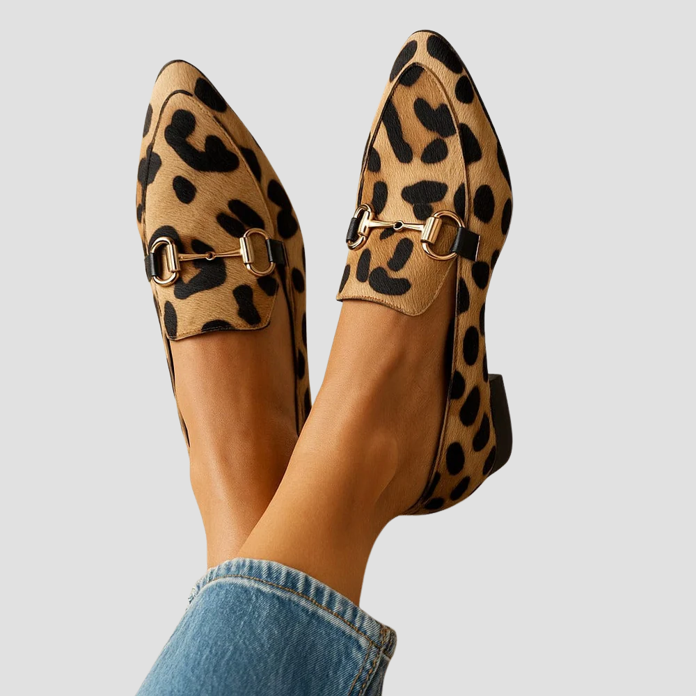 Women's leopard print pointed-toe loafers with gold horsebit, perfect for stylish casual or dressy outfits.