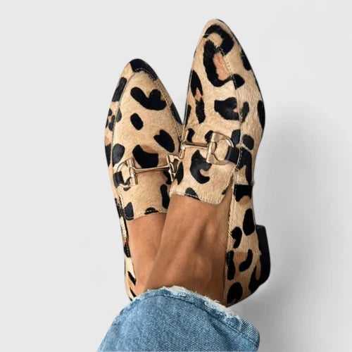 Women's leopard print pointed-toe loafers with gold horsebit. Chic slip-on flats for fashion-forward style & comfort.