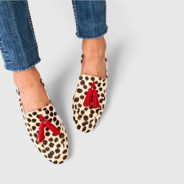 Women's leopard print slip-on orthopedic loafers offering stylish comfort and support for casual and everyday wear.