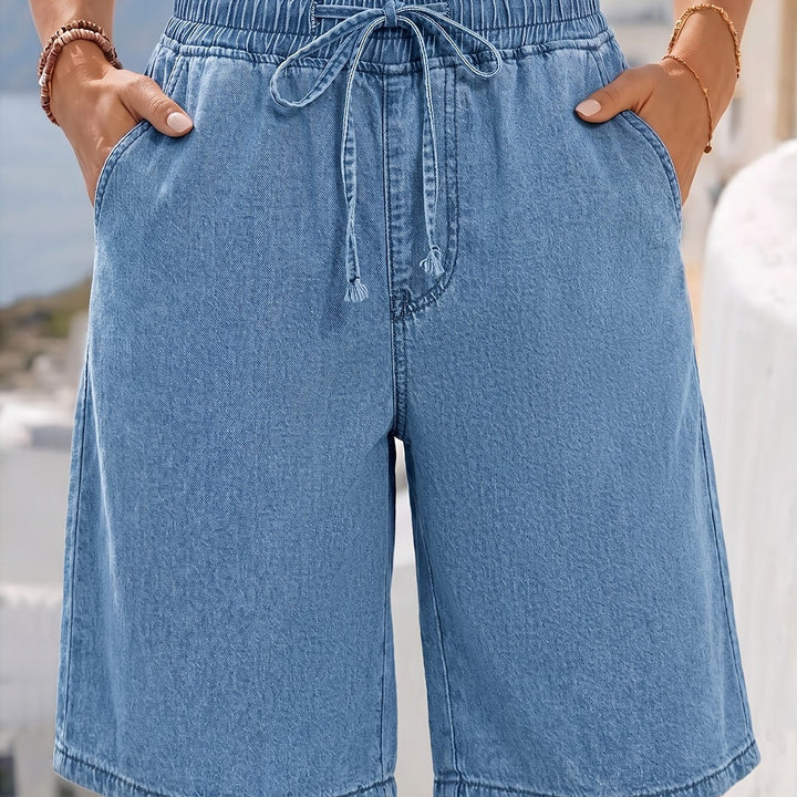 Soft light blue denim Bermuda shorts for women, featuring a comfy drawstring elastic waist & wide leg design.