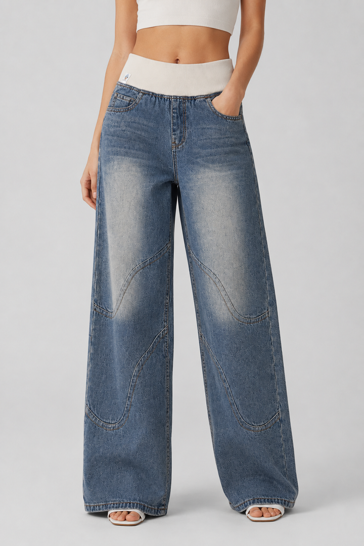 Fashionable women's light blue wide leg jeans with a relaxed, loose fit for comfortable casual wear.