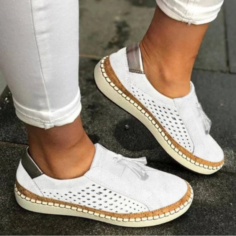 Breathable mesh women's slip-on walking shoes, offering lightweight comfort for athletic and daily activities.
