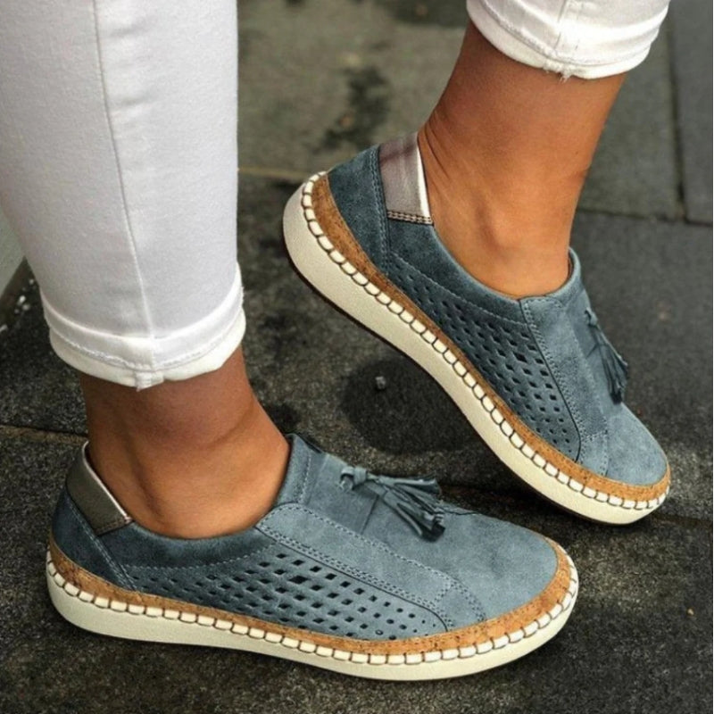 Stylish women's slip-on walking shoes; lightweight, breathable design for casual & active daily wear.