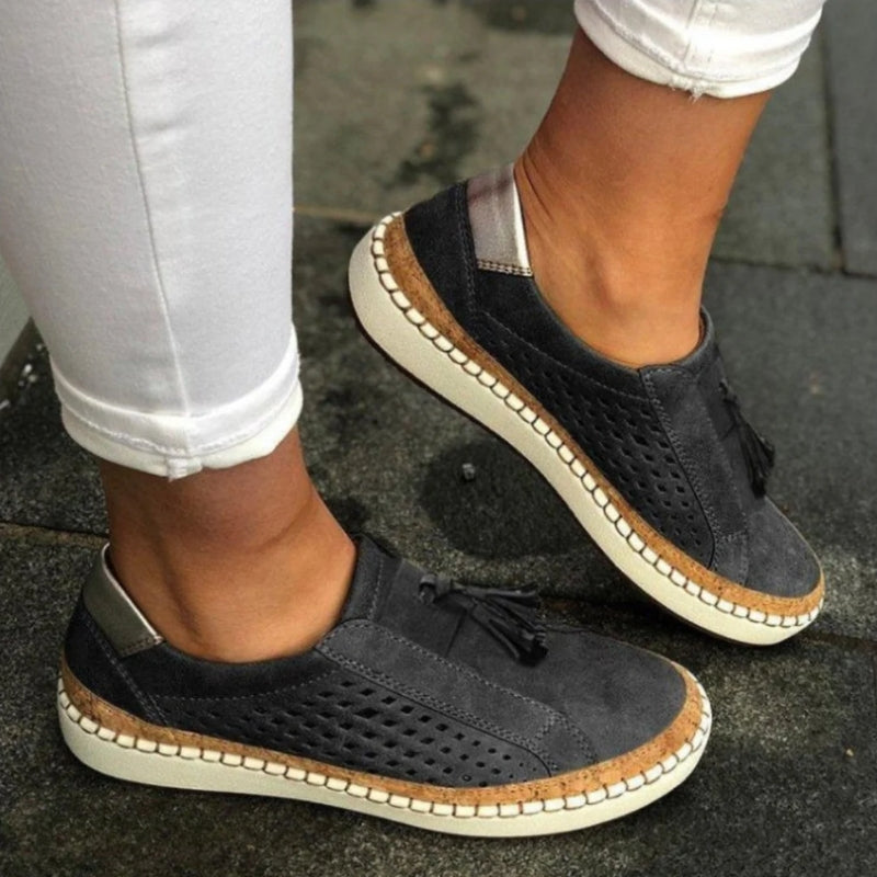 Comfortable women's slip-on walking sneakers, featuring a lightweight & breathable design for all-day wear.