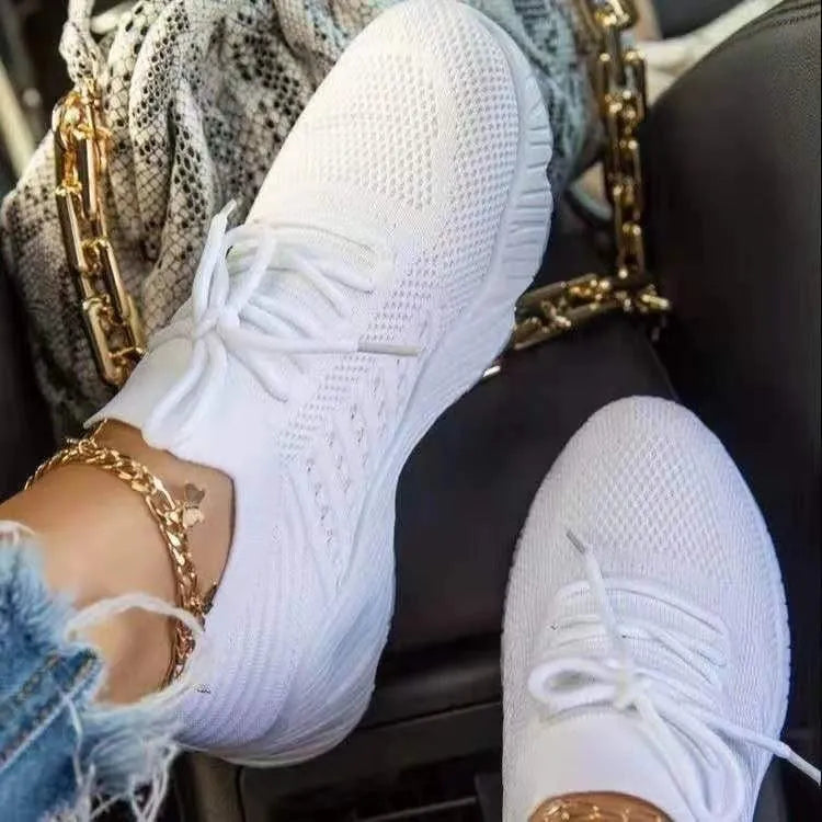Breathable mesh women's sneakers with a non-slip sole, perfect for athletic activities and everyday comfort.