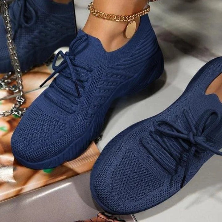 Stylish women's walking shoes with a breathable upper and a durable non-slip sole for secure comfort.