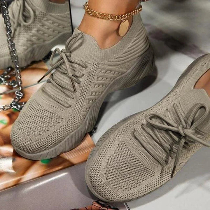 Ergonomic women's lightweight sneakers, designed for breathability and non-slip security, perfect for active wear.
