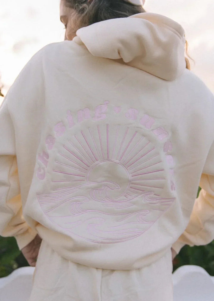 Comfortable cream women's lightweight breathable hoodie, a versatile top for everyday summer style.