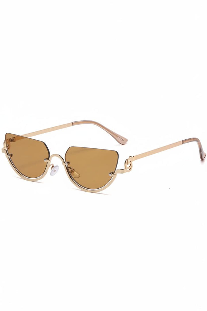 Chic women's cat eye sunglasses with UV protection. Lightweight metal frame for glamorous, comfortable eyewear.