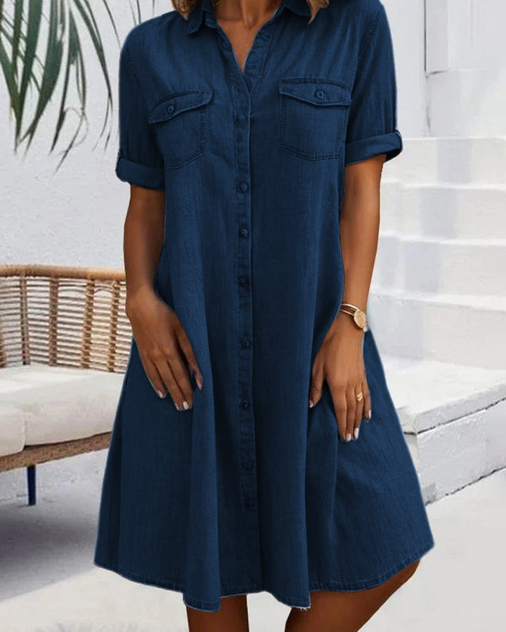 Casual women's lightweight chambray shirt dress with a button-front closure.