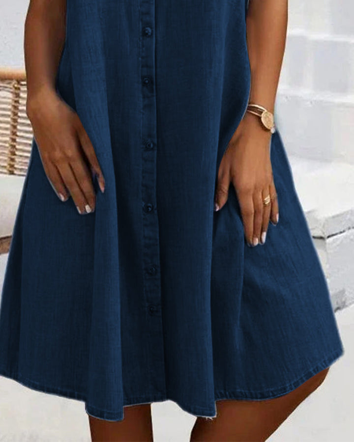 Lightweight women's shirt dress with a denim aesthetic, featuring a full button placket.