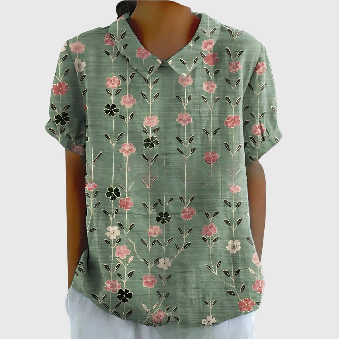 Women's lightweight floral blouse with a relaxed fit, perfect for spring & summer casual wear.