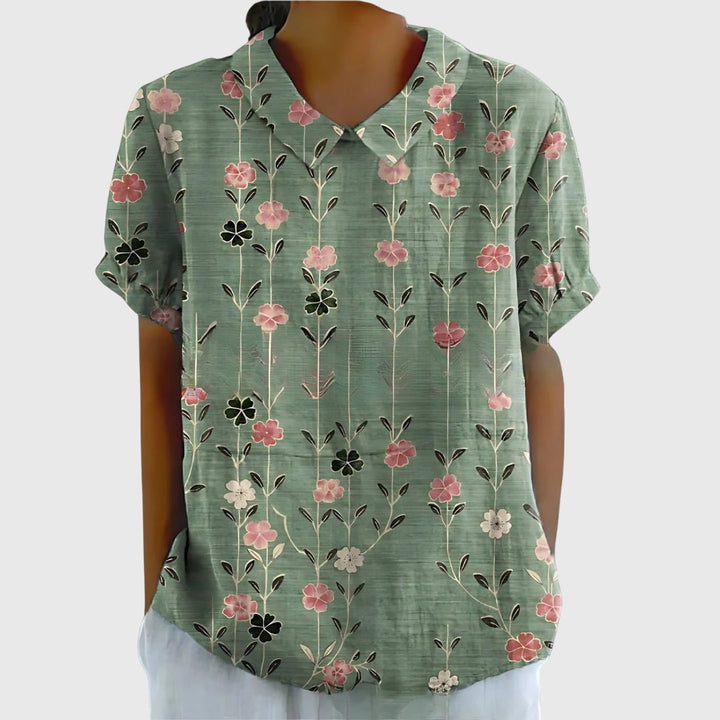 Women's lightweight floral blouse with a relaxed fit, perfect for spring & summer casual wear.