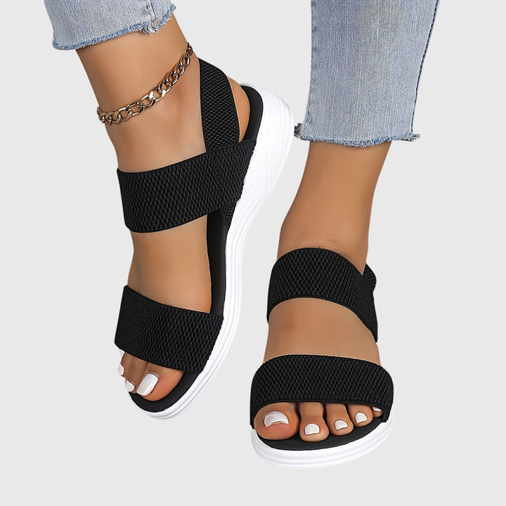 Women's lightweight orthopedic sandals with adjustable arch support for comfortable daily walking.