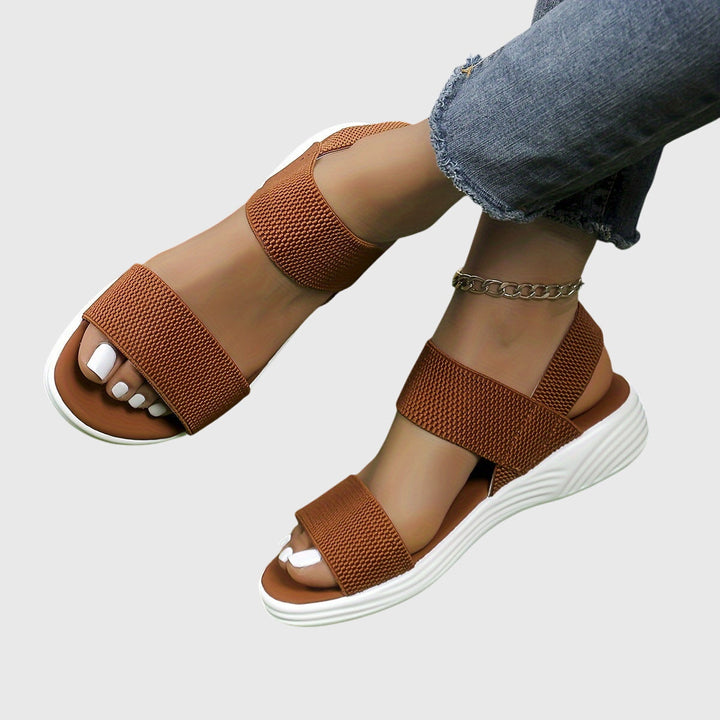 Ergonomic women's walking sandals, lightweight, orthopedic, with adjustable arch support for optimal comfort.