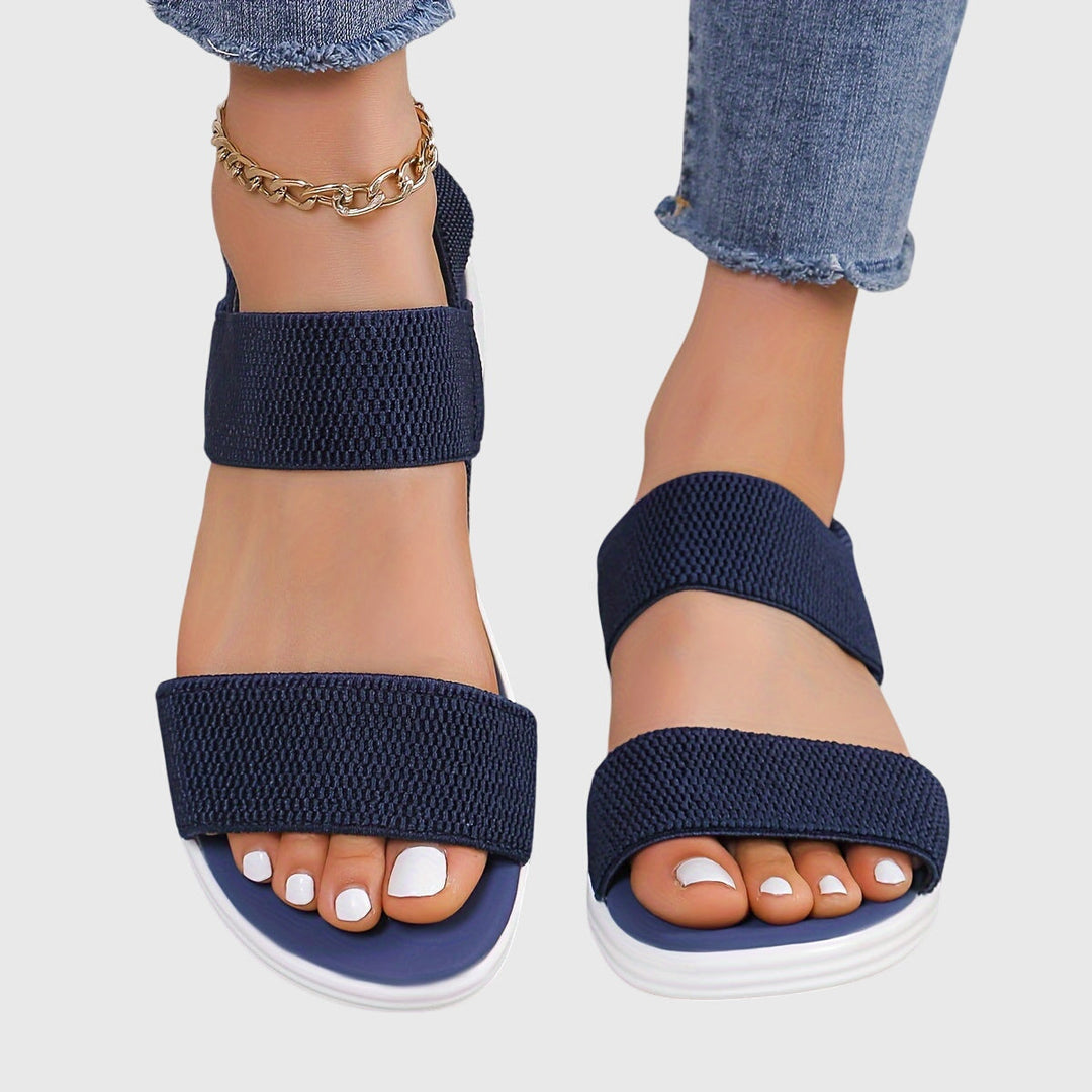 Adjustable women's sandals, ergonomic design with arch support, ideal for lightweight daily wear.