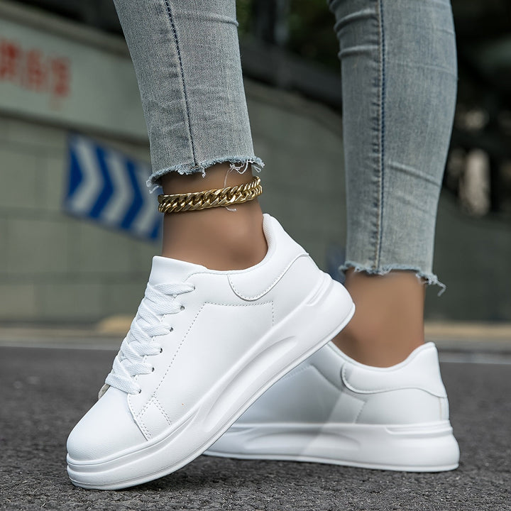 Women's lightweight orthopedic sneakers, all-day comfort. White/grey breathable mesh walking footwear.