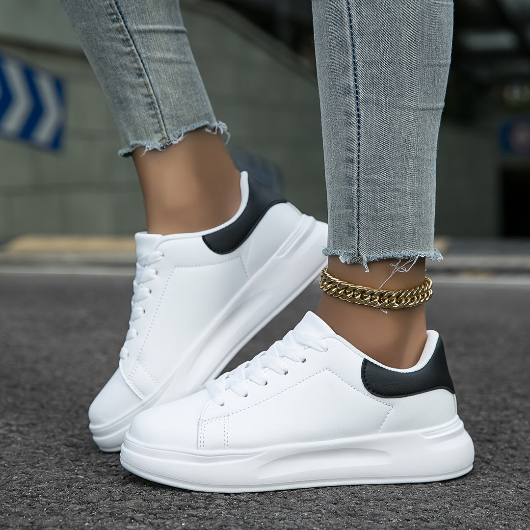 Rear view of women's athletic orthopedic sneakers, featuring heel support for walking comfort.