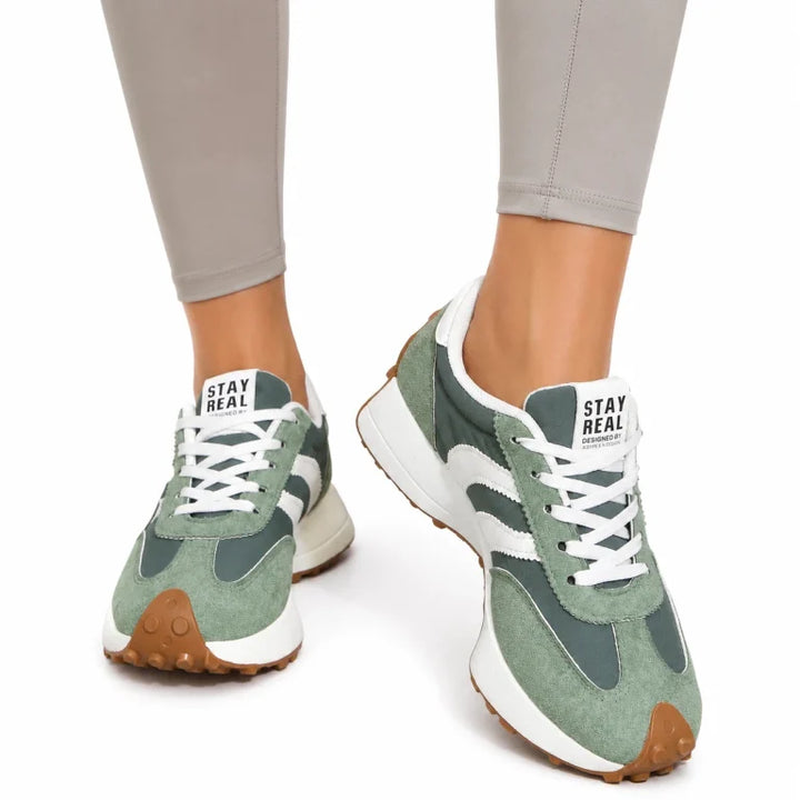 Women's comfort trainers with a wide toe box for ergonomic orthopedic support.