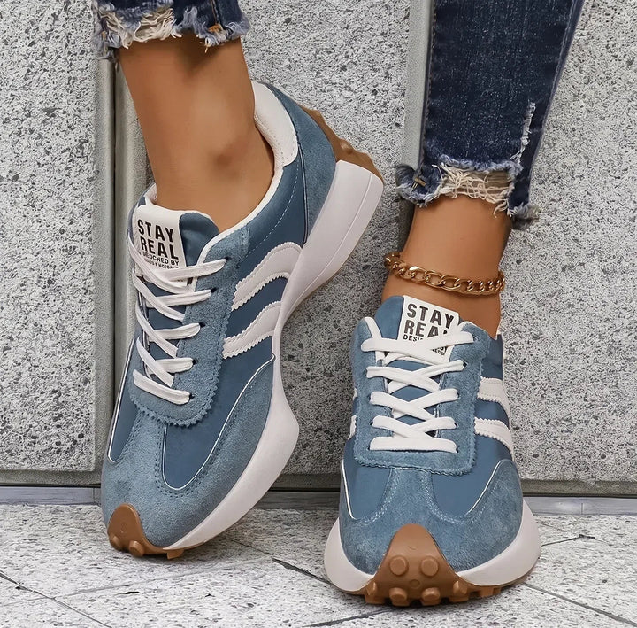 Orthopedic women's trainers with arch support for comfortable walking and daily wear.