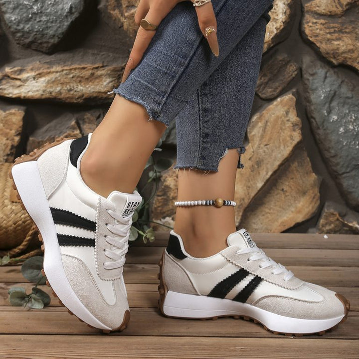 Women's orthopedic trainers offering superior arch support for walking comfort.