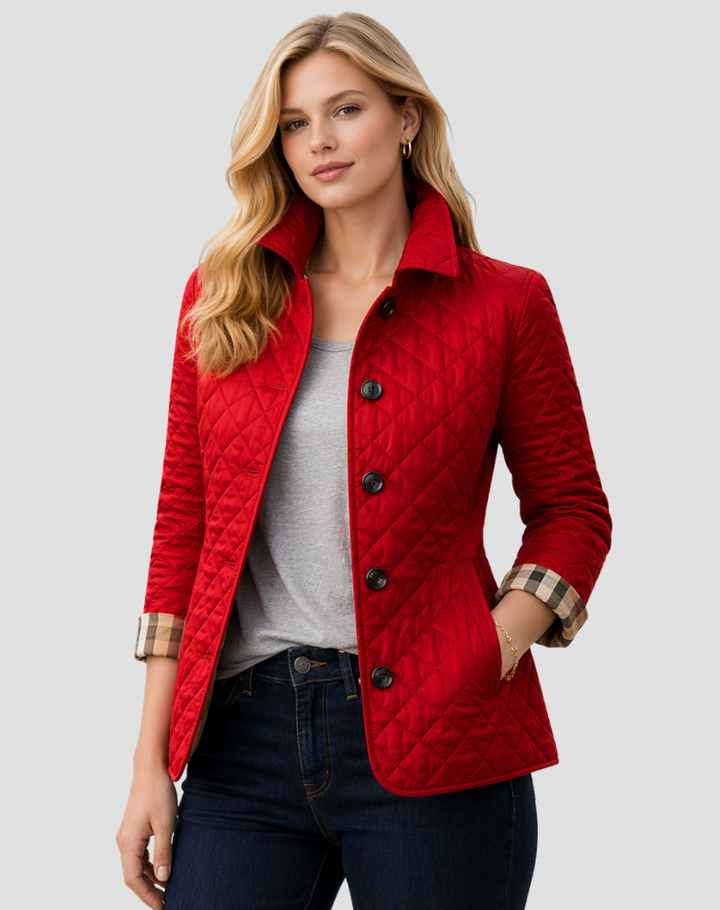 Women's tailored fit quilted jacket, offering lightweight comfort & a polished silhouette for modern style.