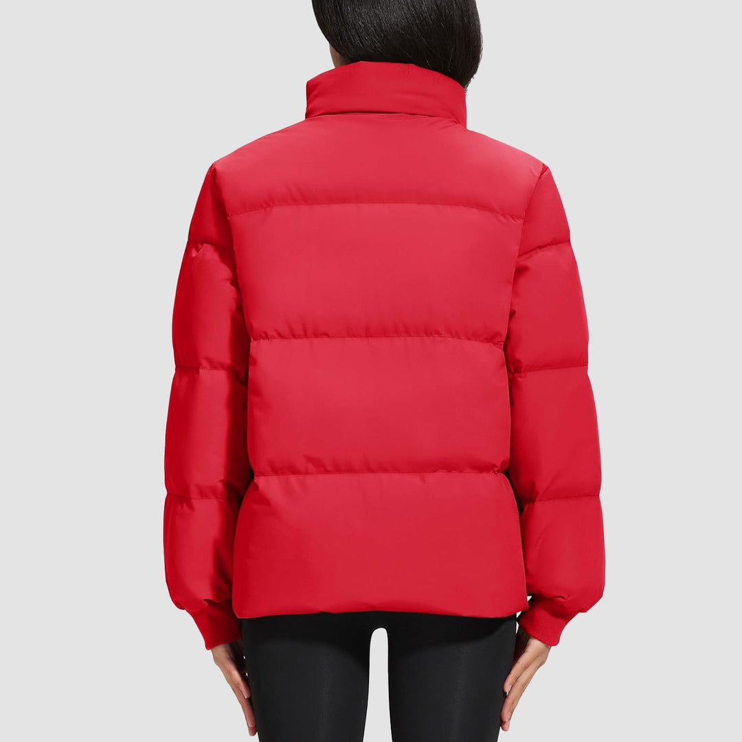 Woman on a cold morning walk, comfortably warm in a black quilted down jacket