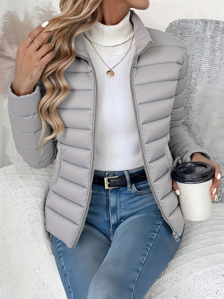 Casual women's fall/winter jacket: lightweight quilted puffer for warmth, ideal for everyday activities.