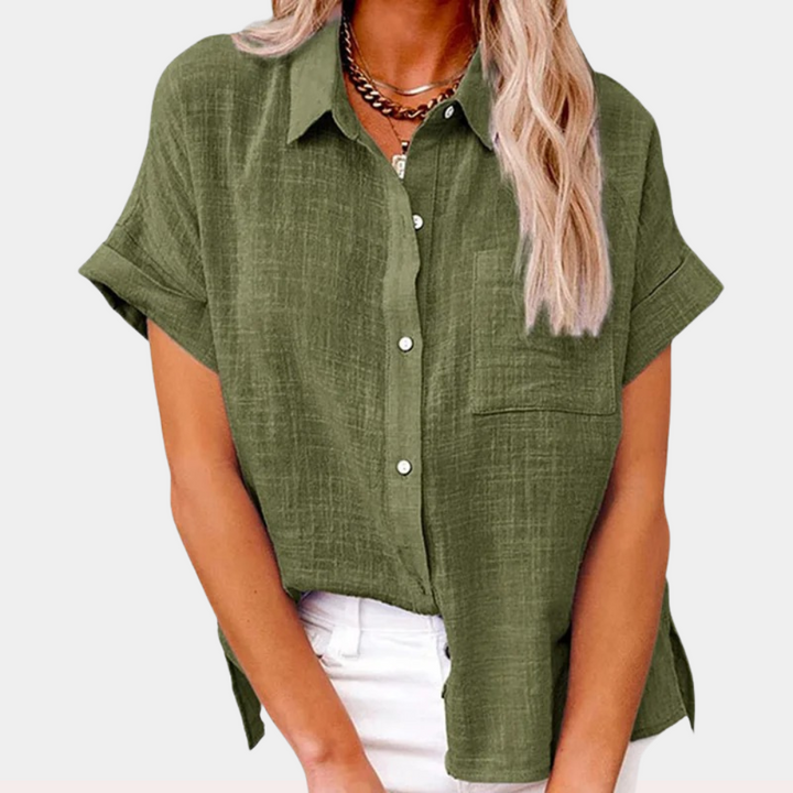 Comfortable women's short sleeve blouse with a relaxed fit & button front, ideal for warm weather style.