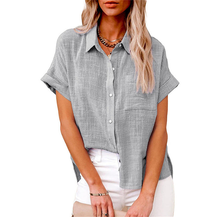 Women's comfortable short-sleeve top; lightweight fabric, button-front design, and a stylish breast pocket.