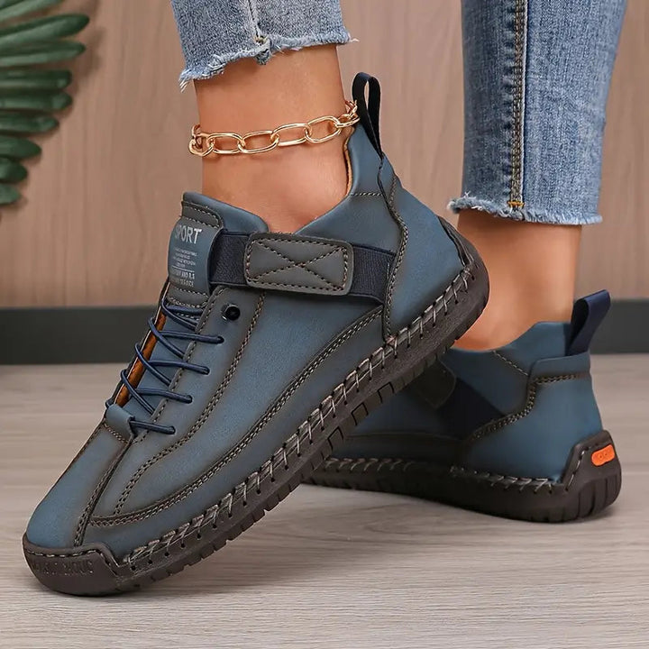 Wide fit women's slip-on walking shoes, offering everyday comfort and support.