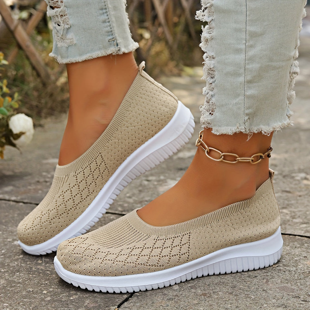 Comfortable women's slip-on walking shoes, designed for easy wear and athletic casual style.