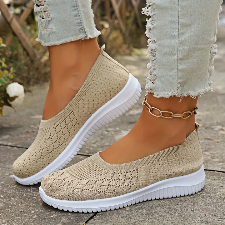 Comfortable women's slip-on walking shoes, designed for easy wear and athletic casual style.