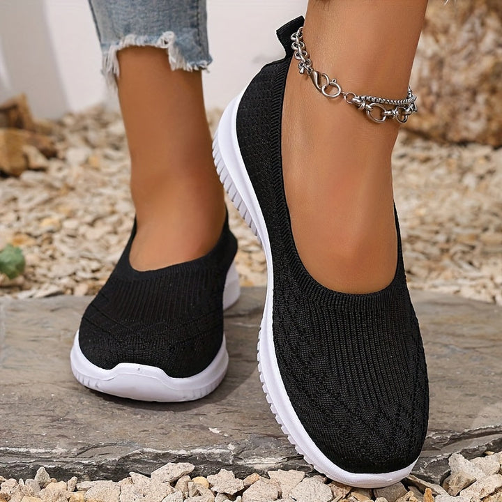 Breathable women's slip-on sneakers offering lightweight comfort for daily walks & active lifestyles.