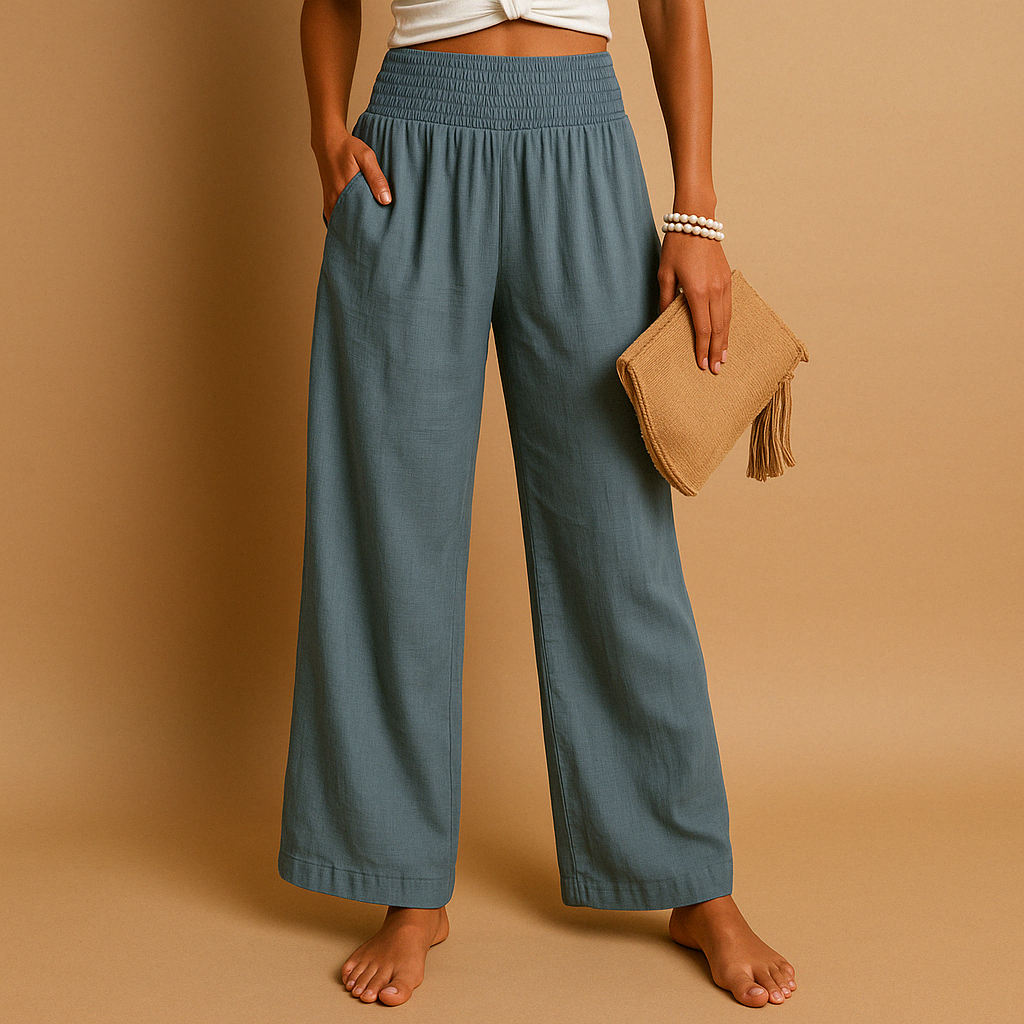 Khaki women's lightweight summer trousers in a breathable loose fit fabric. Comfortable casual pants.