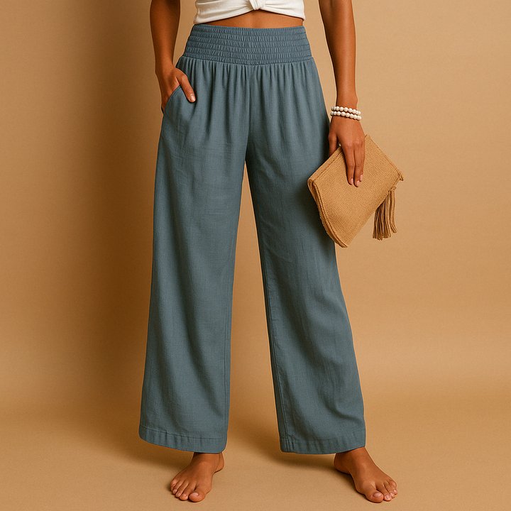 Khaki women's lightweight summer trousers in a breathable loose fit fabric. Comfortable casual pants.