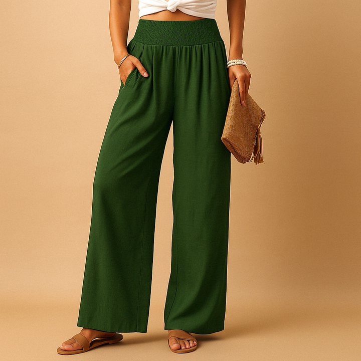 White women's flowy summer trousers, lightweight and breathable. Loose fit casual pants with elastic waist.