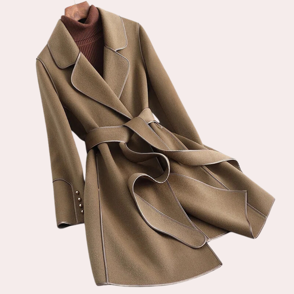 Woman wearing a stylish lightweight trenchcoat, perfect for fall fashion & versatile outerwear. Loose fit design.