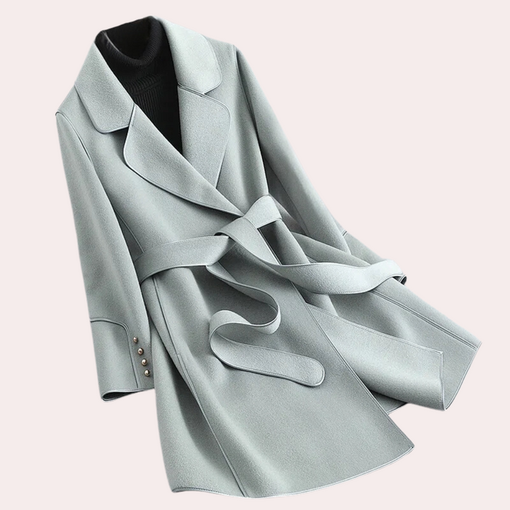 Chic women's lightweight trenchcoat with a roomy silhouette. Essential spring & fall outerwear. Versatile style.
