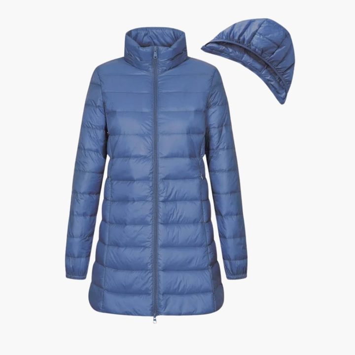 Women's quilted long puffer jacket with a hood for ultimate winter warmth. Stylish and cozy cold-weather outerwear.