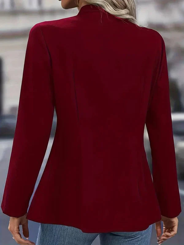 Long sleeve women's military style button-down blouse, a must-have chic top.