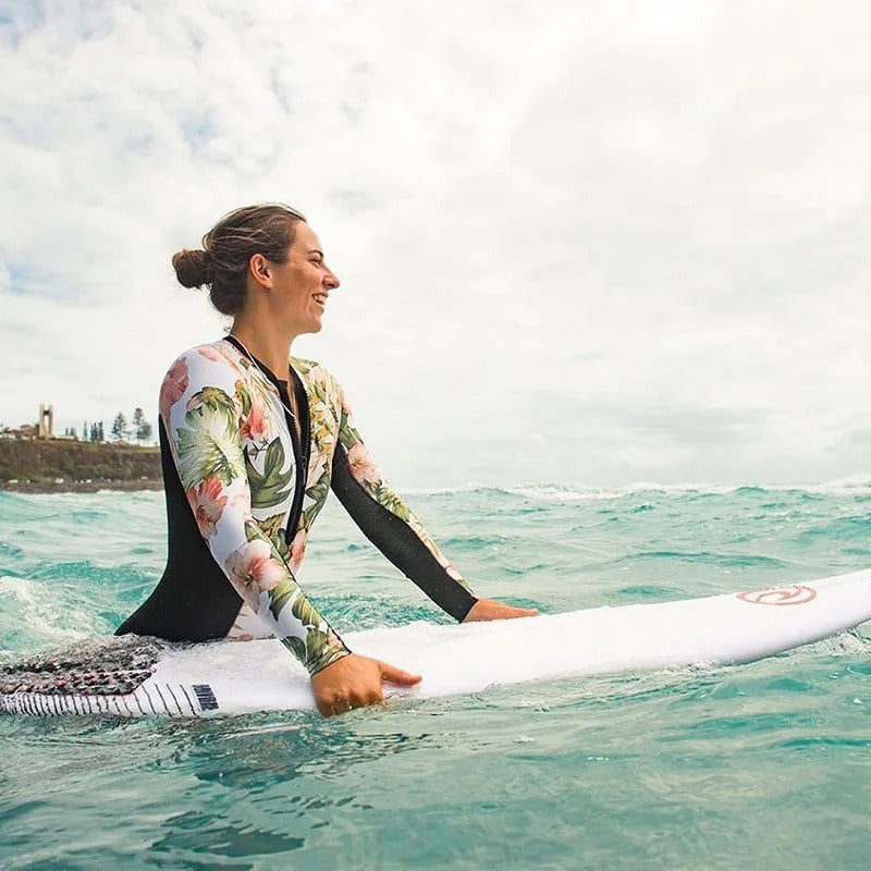 Women's full coverage long sleeve one-piece swimsuit with zipper, ideal for athletic beachwear & sun protection.