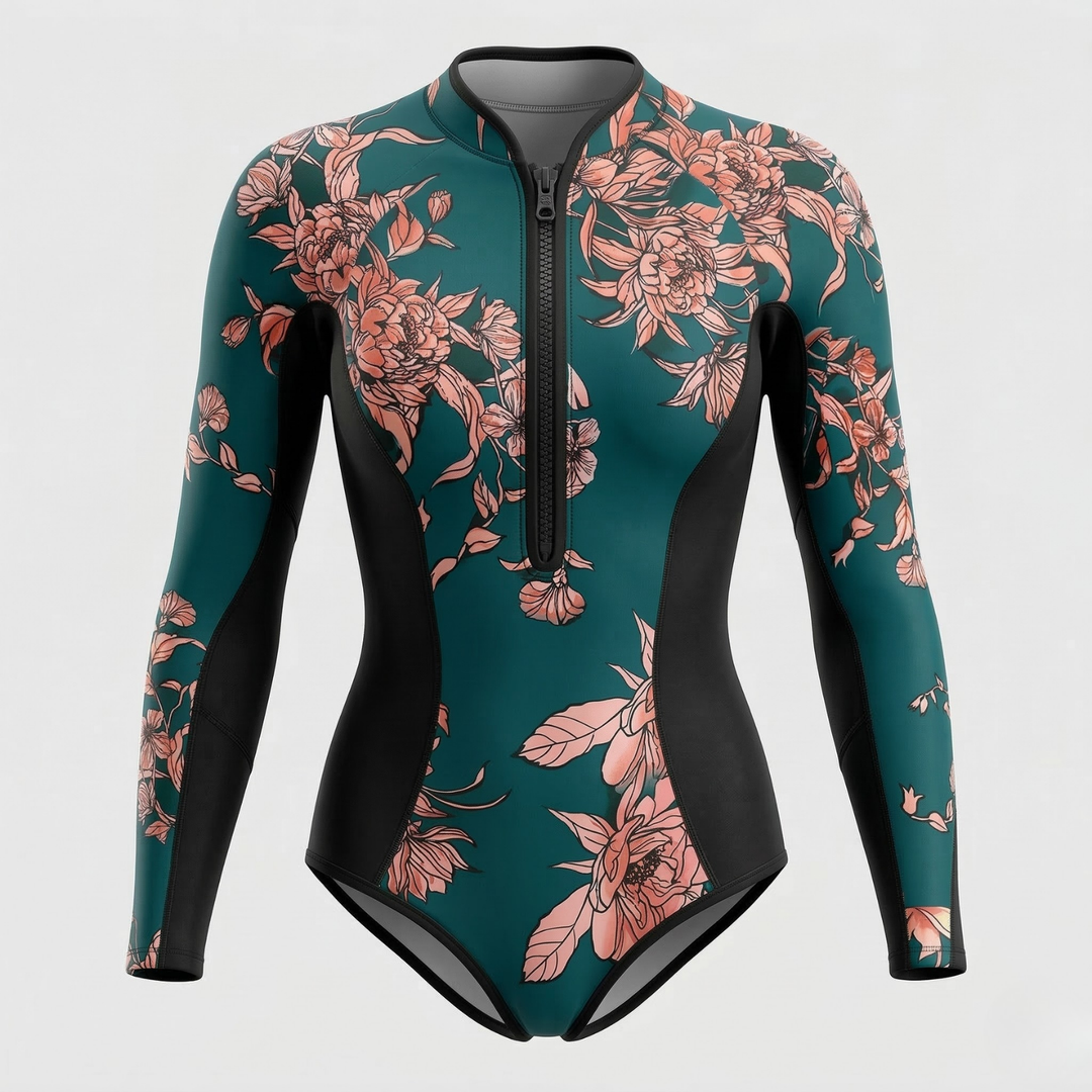 Close-up of women's long sleeve tropical print surf suit, showing vibrant pattern & UV protection fabric.
