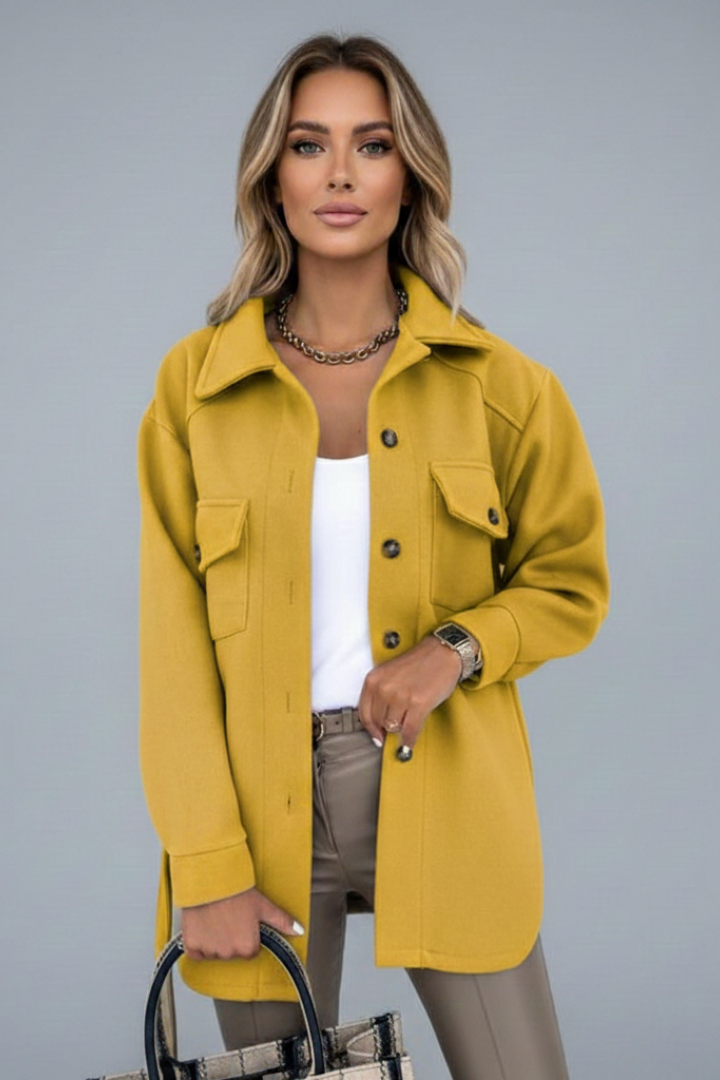 Women's versatile longline shacket. Button-front, collared shirt jacket ideal for casual layering outerwear.