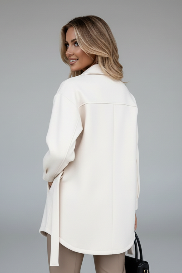Light blue women's collared shacket. Longline button-front jacket for layering & casual outerwear.