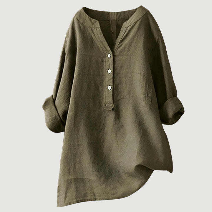 Stylish women's loose fit blouse, comfortable spring/summer fashion top.