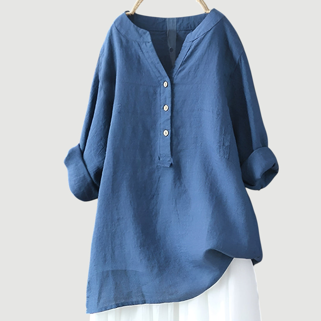 Casual women's loose fit blouse, comfortable button-up top for everyday wear.